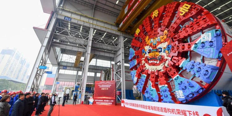 China unveiled new dragon-themed drillers that it hopes will build the world's 'longest undersea high-speed railway tunnel'