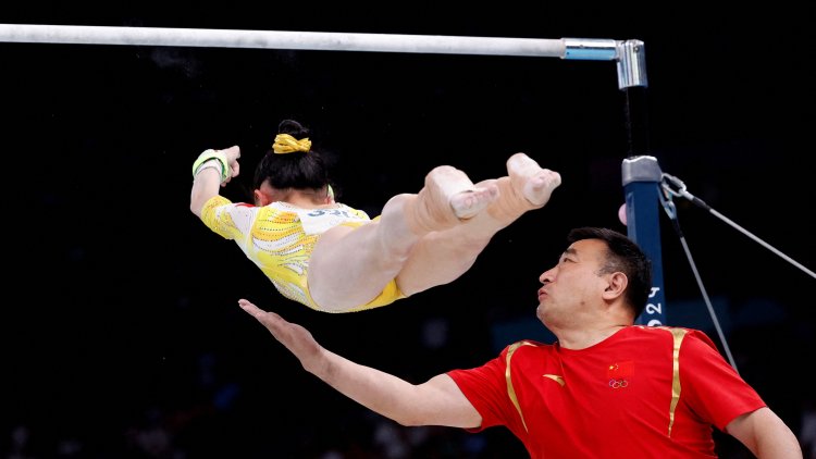 Olympics Photo of the Day: Catching a Fall